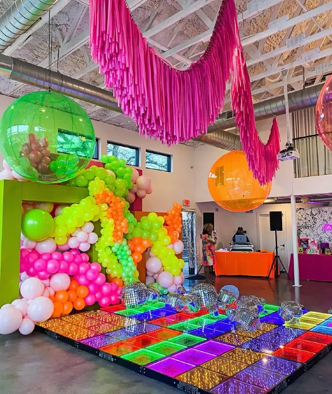 Retro Party Room with Overhead Fringe and Light Up Floor