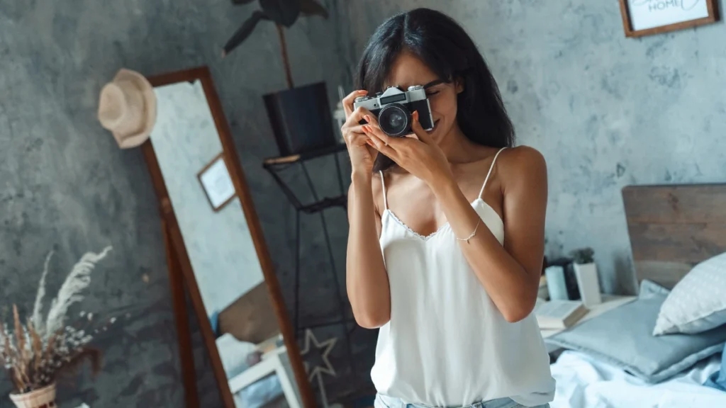 female taking photos