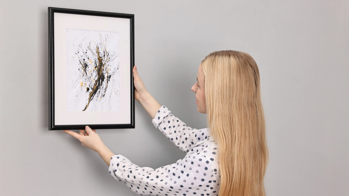 Why Your Walls Are Still Bare (And the No-Nail Fix for It)