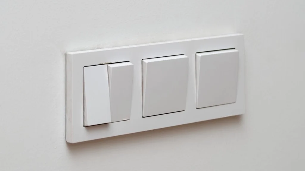 Swap White Plastic Switch Plates for Cheap Living Room Upgrades