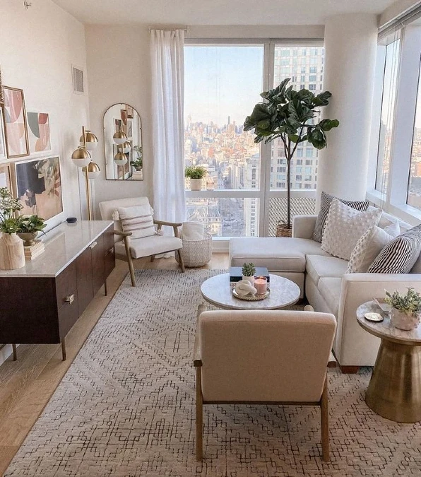 Floor to Ceiling Windows and Monochromatic Rugs