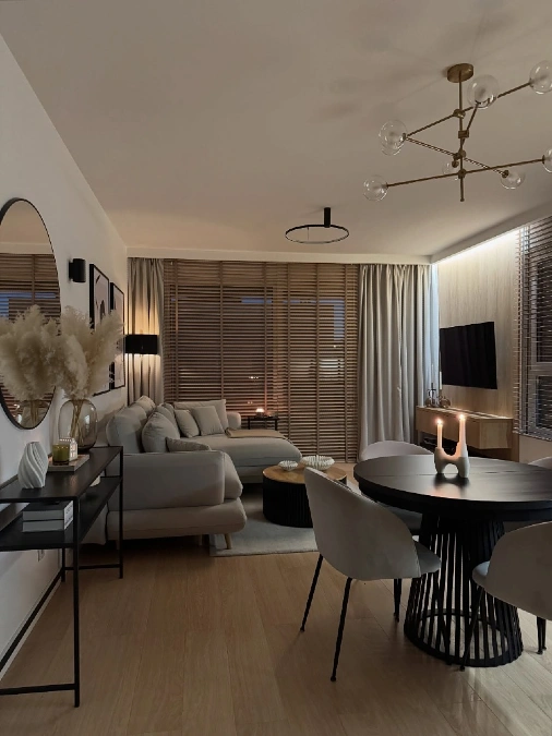 Slat Base Tables and Large Round Wall Mirrors