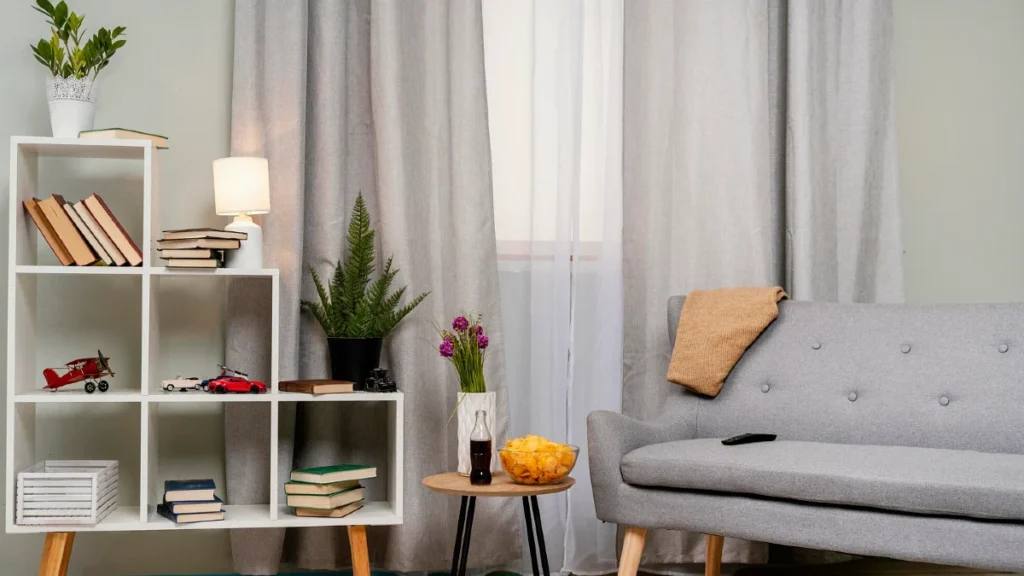 Book Drenching Replaces Bare Living Room Walls