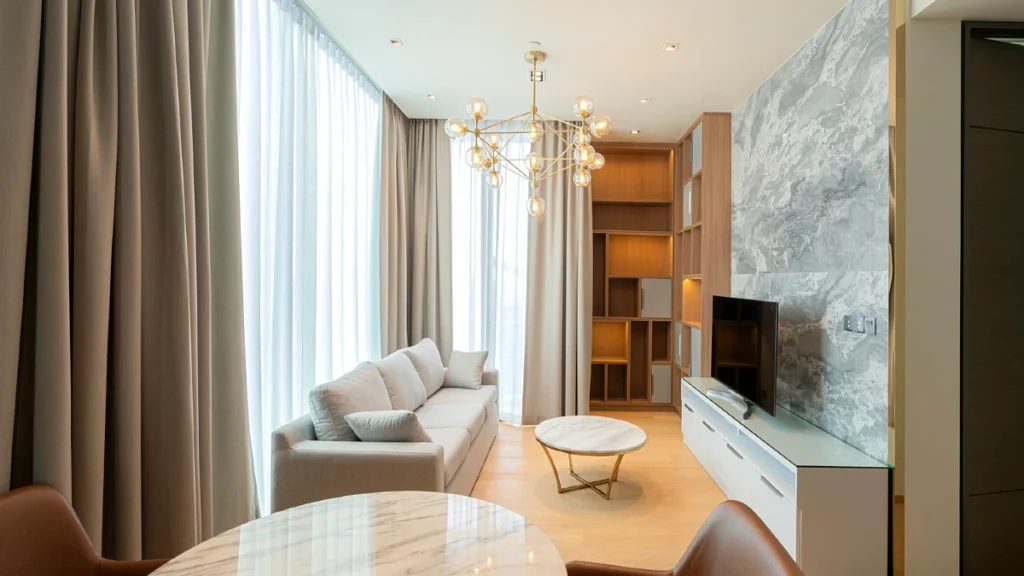Why Standard Curtain Placement Shrinks Your Room