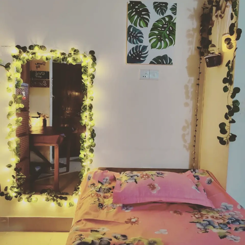Bedding and Vine Wrapped Mirrors
