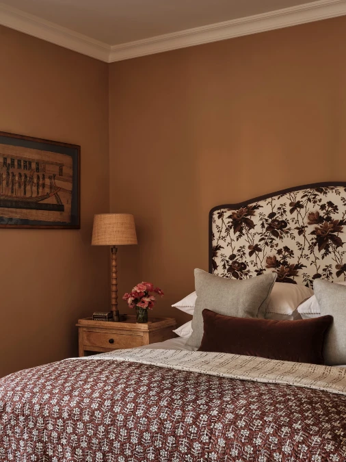 Floral Patterns Soften Caramel Bedroom Walls