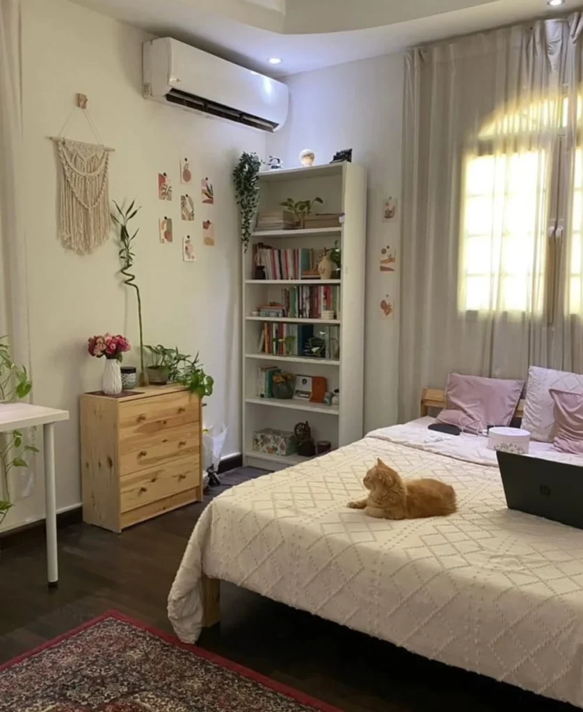 Neutral Bohemian Bedroom with Bookshelves