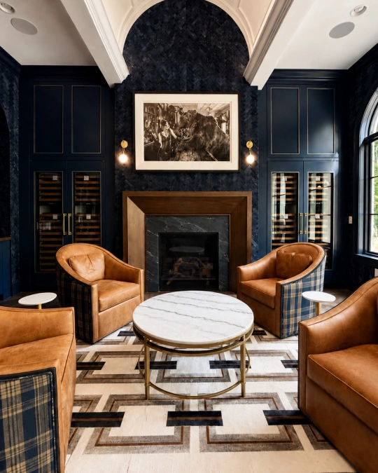 Rich Cognac Leather And Textured Navy Walls