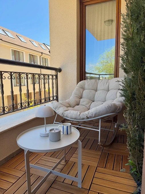 Cream Papasan Chair + Wood Decking