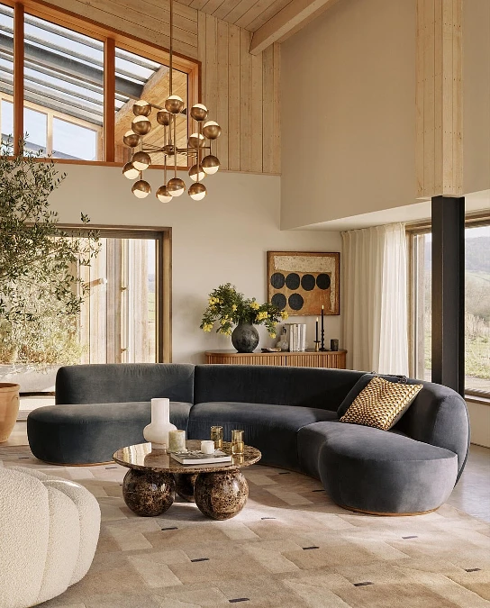Curved Sofa + Marble Table + Brass Lighting
