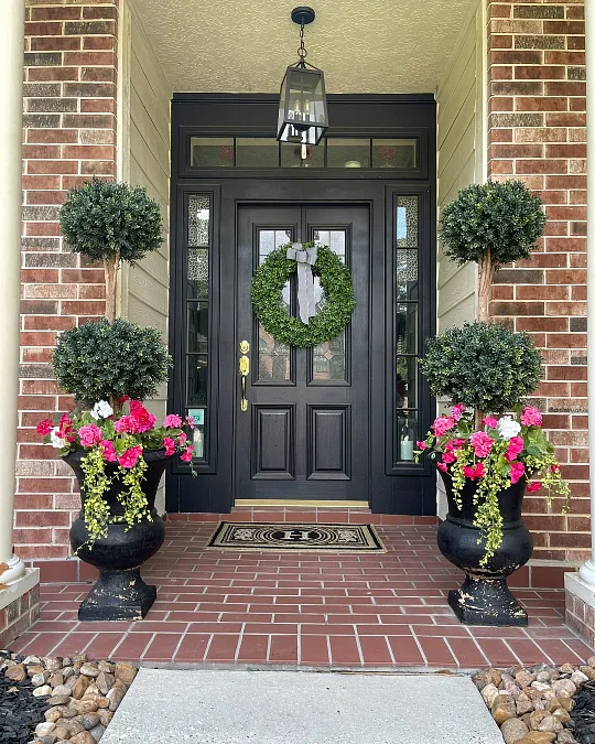 Black Entry with Bright Pink Planters