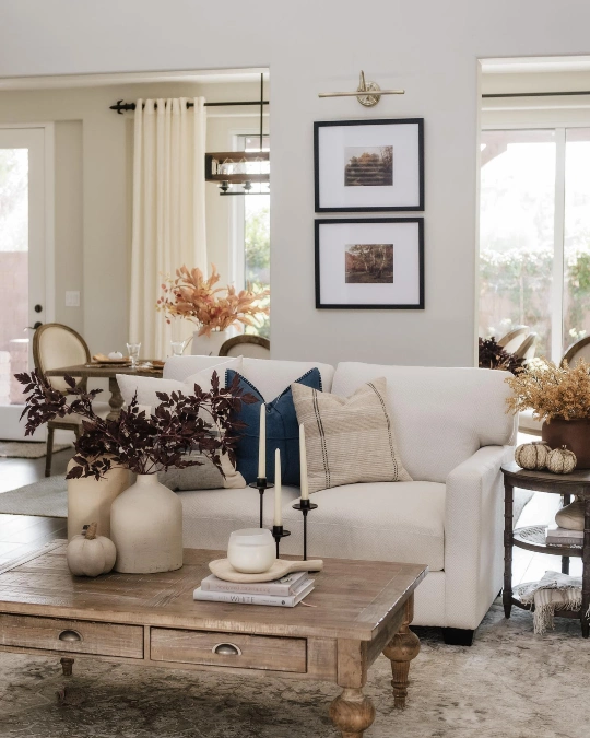White Sofa with Moody Autumn Branches