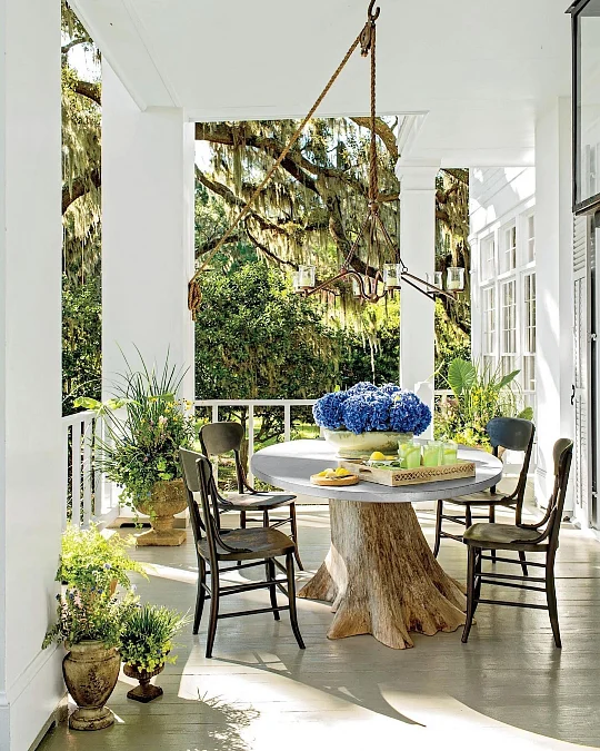 Hydrangea Dining Table Under a Rope Chandelier
