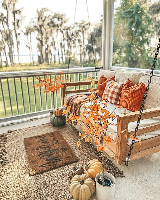 Porch Swing with Rust Plaid Layers