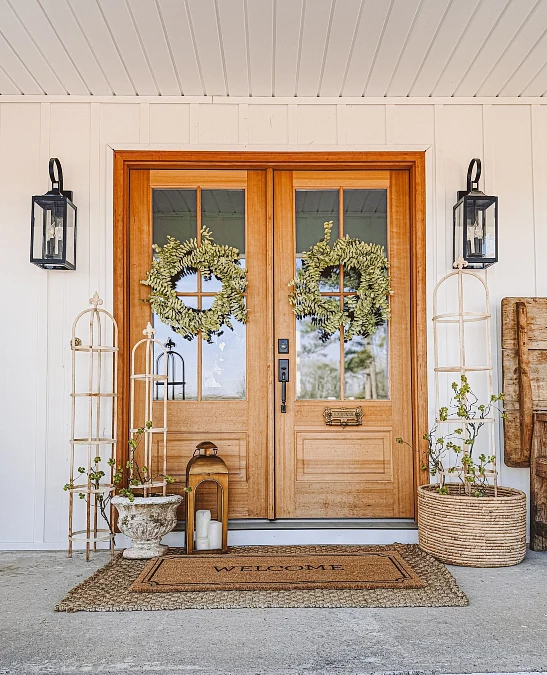 Natural Wood Doors with Layered Greenery