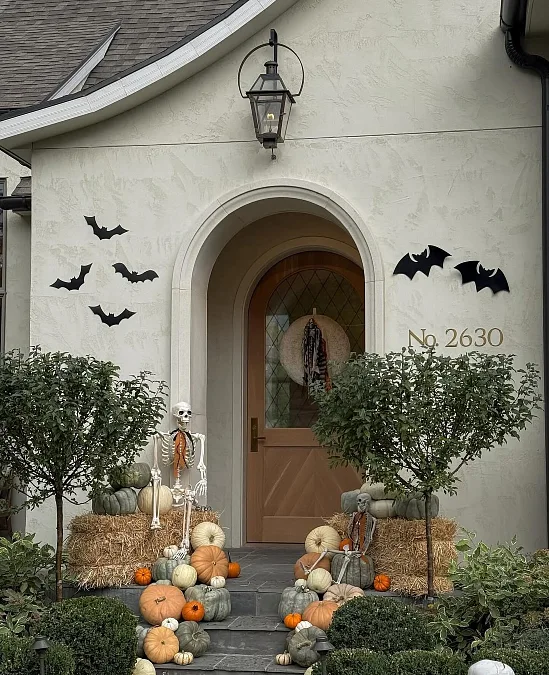 Muted Pumpkin and Skeleton Porch