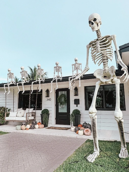 Giant Skeletons Across the Front Porch