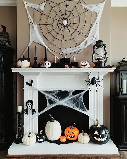 Spiderweb Mantel with Black and White Pumpkins