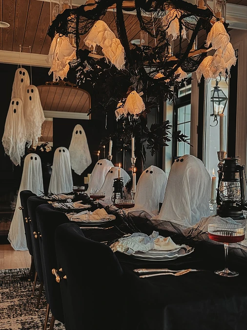 Ghost Chairs and Black Chandelier Draping