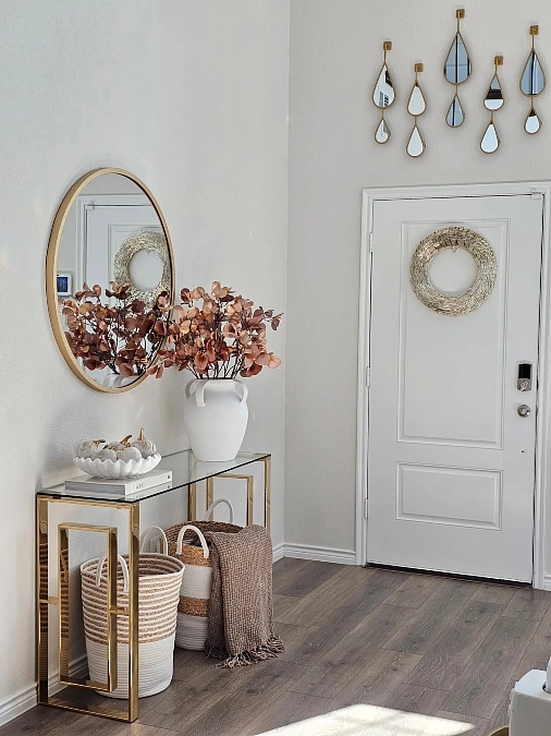 Light Neutral Entryway with Brass Details