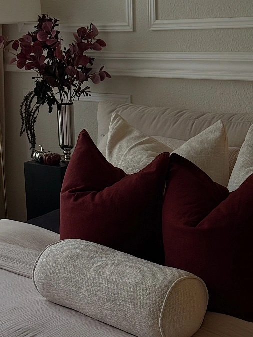 Burgundy Velvet Pillows on Cream Seating